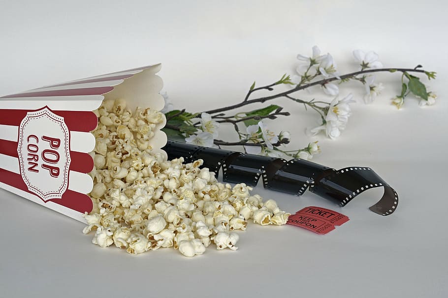 spilled, popcorn, negative, film, white, petaled flower, cinema, ticket, entertainment, food