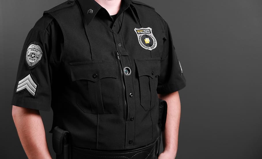 man, wearing, black, uniform, bodyworn, body camera, police body camera, law enforcement, cops, law enforcing