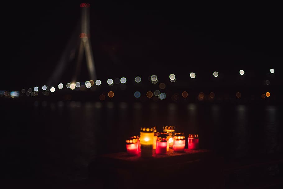 votive, candles, floating, water, selective, focus, photography, lights, dark, night