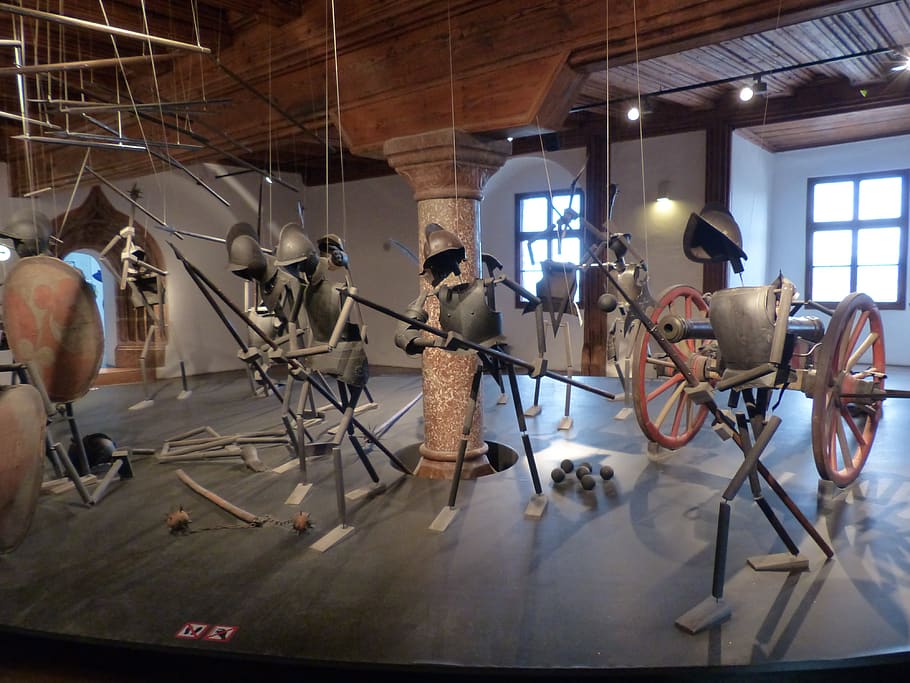 knight, middle ages, marionette theatre, installation, fight, swords, cannon, indoors, window, representation