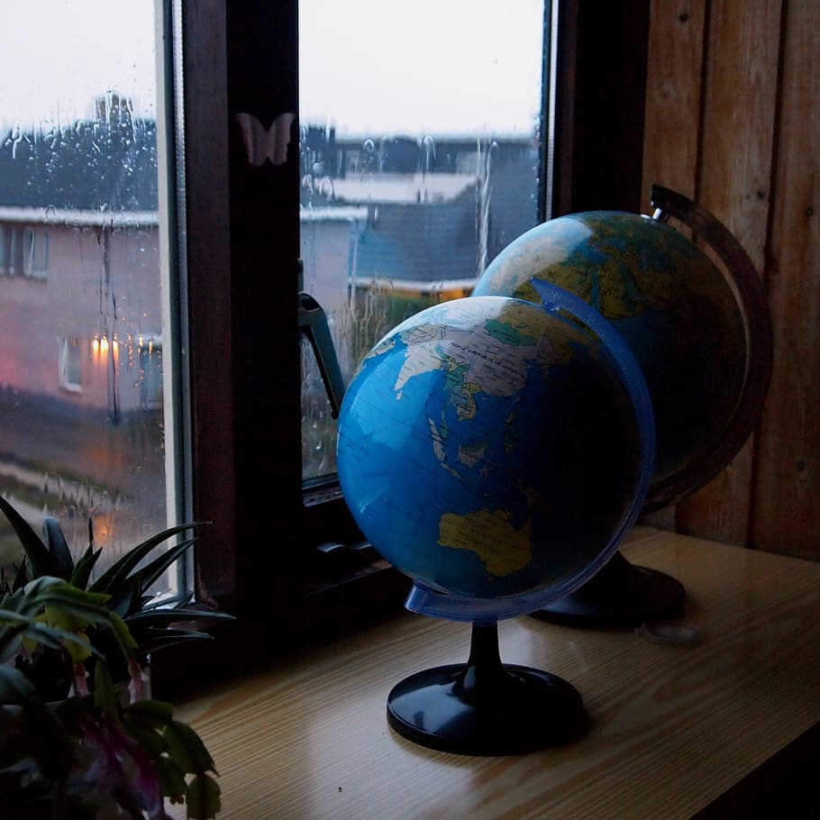 globe, window sill, rain, window, room, blue, vista, globe - man made object, indoors, table