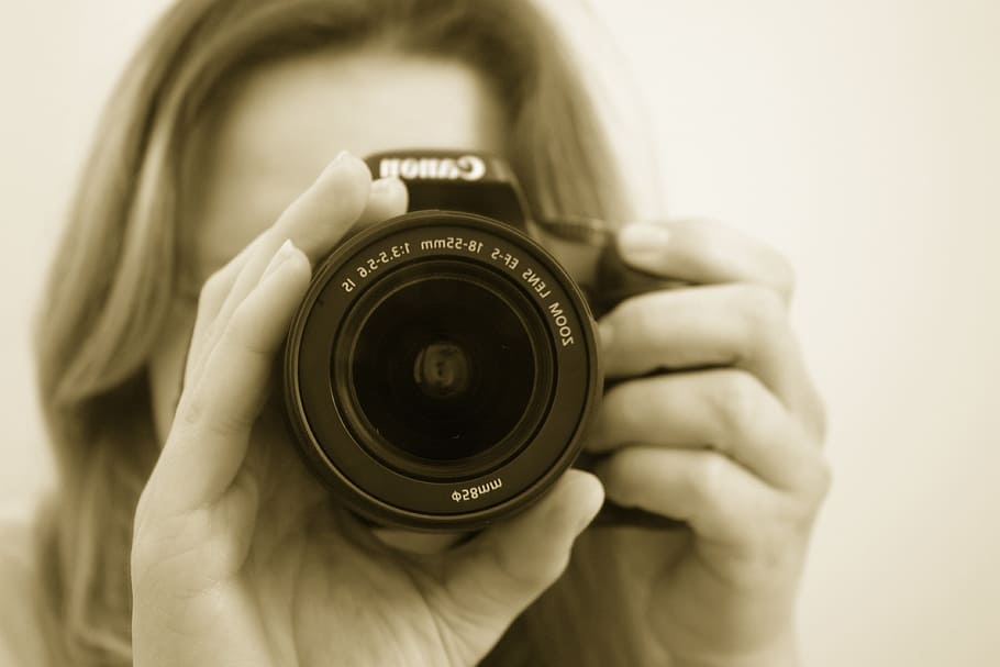 woman, holding, black, canon camera, photographer, camera, lens, slr, shoots, people