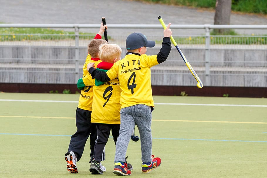 three, boy, wearing, yellow, jersey, holding, field hockey sticks, hockey, friends, sport