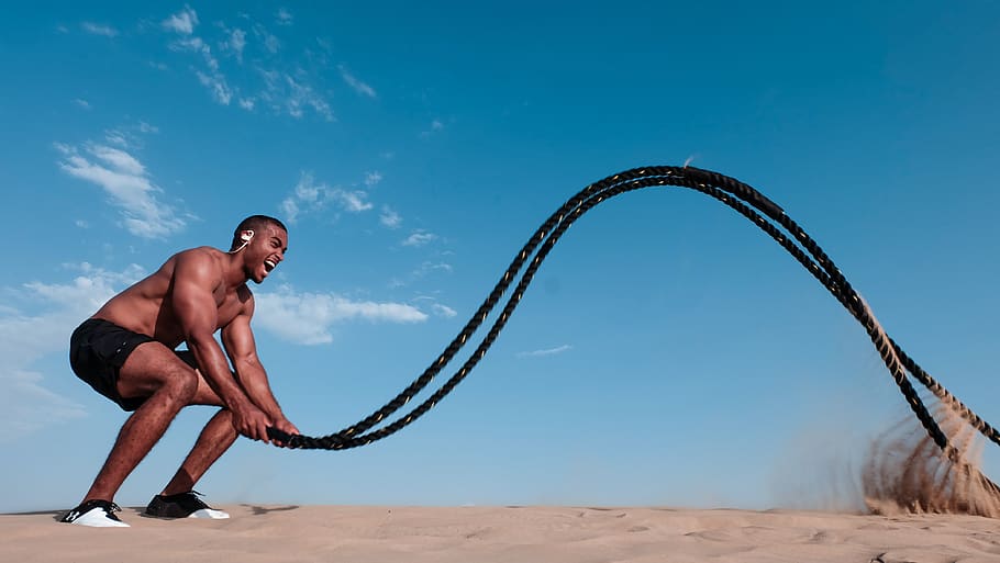 man, workout, rope, strength, power, sand, desert, blue sky, black, eadphones