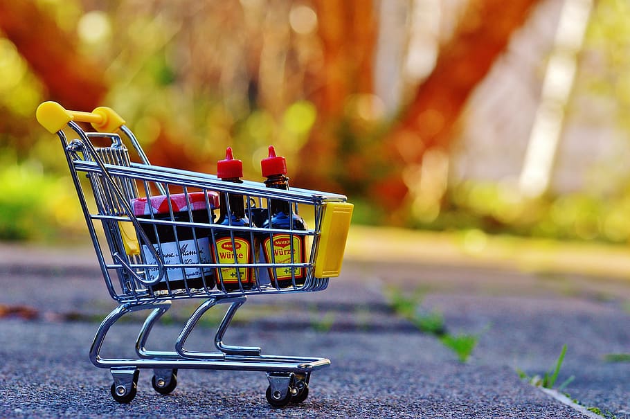 gray, metal shoppers cart, pavement, tilt-shift photo, shopping cart, shopping, purchasing, candy, trolley, shopping list