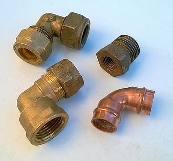 plumbing-fittings-pipe-connection-brass-construction-royalty-free-thumbnail.jpg