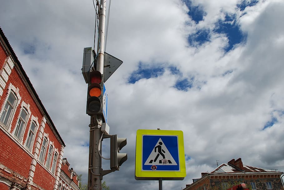 traffic, yellow signal, carefully, crosswalk, road sign, sky, street, sign, cloud - sky, communication