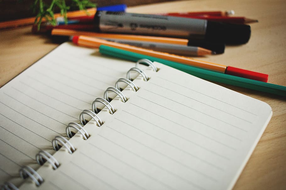 white spiral handbook, desk, lines, note, notebook, notepad, notes, paper, pen, pencil