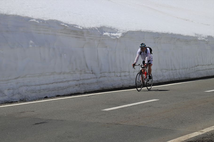 mountain, cyclist, snow, the alps, highway, the side of the road, travel, sport, cycling, speed