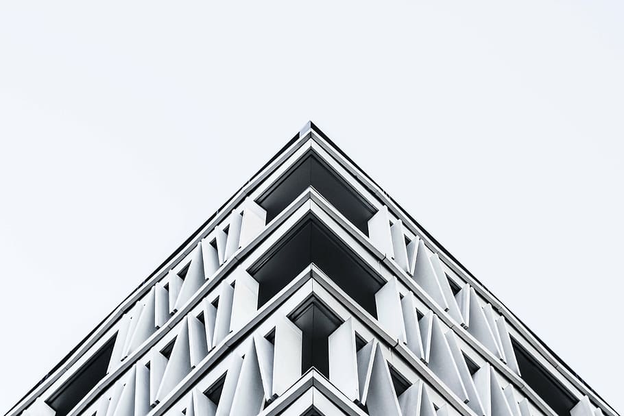 low-angle photography, white, high, rise building, black, art, pyramid, figure, building, architecture