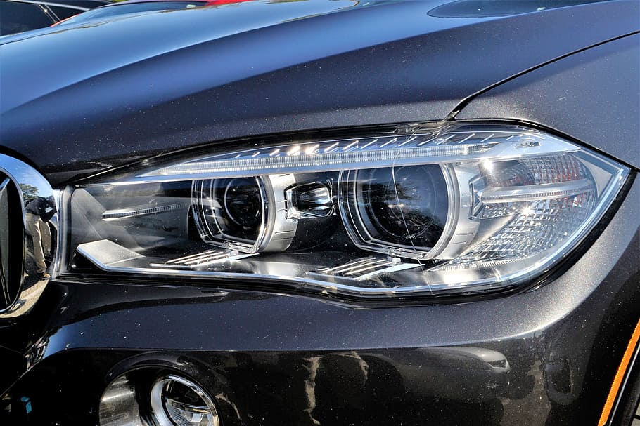 close-up photo, black, vehicle headlight, pre-owned, bmw x5, suv, headlamp, head light, grill, front