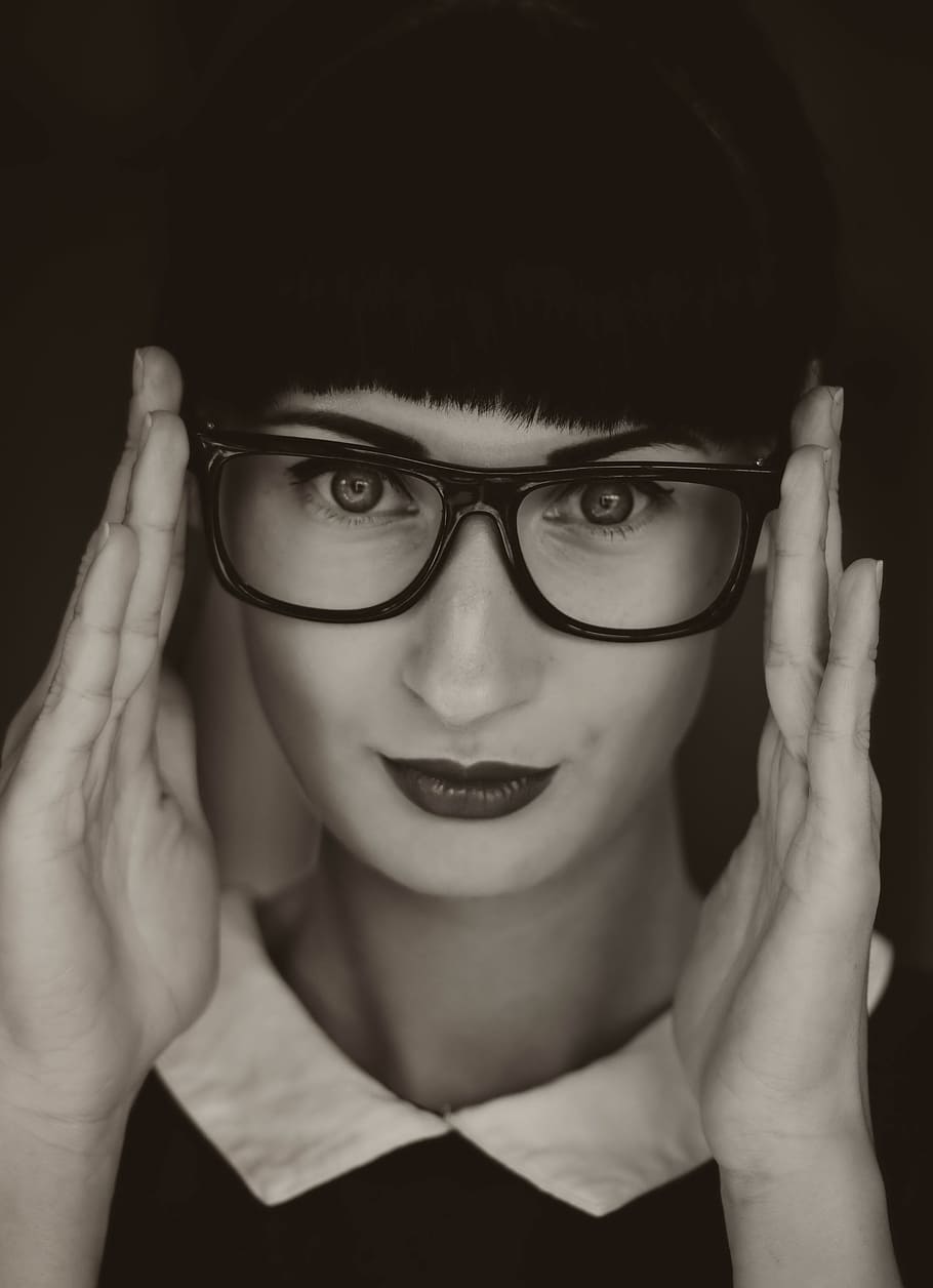 grayscale photograph, woman, wearing, wayfarer-style sunglasses, black and white, person, head, face, portrait, glasses
