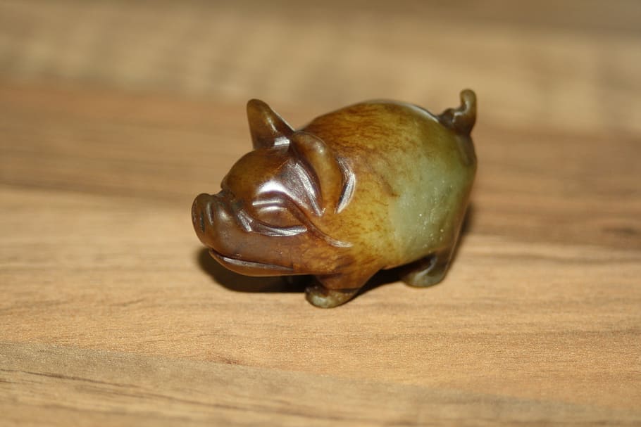 pig, luck, lucky charm, stone, lucky pig, wood - material, indoors, table, single object, close-up