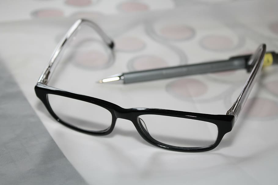 black, framed, eyeglasses, gray, pen, white, printer paper, glasses, reading glasses, study