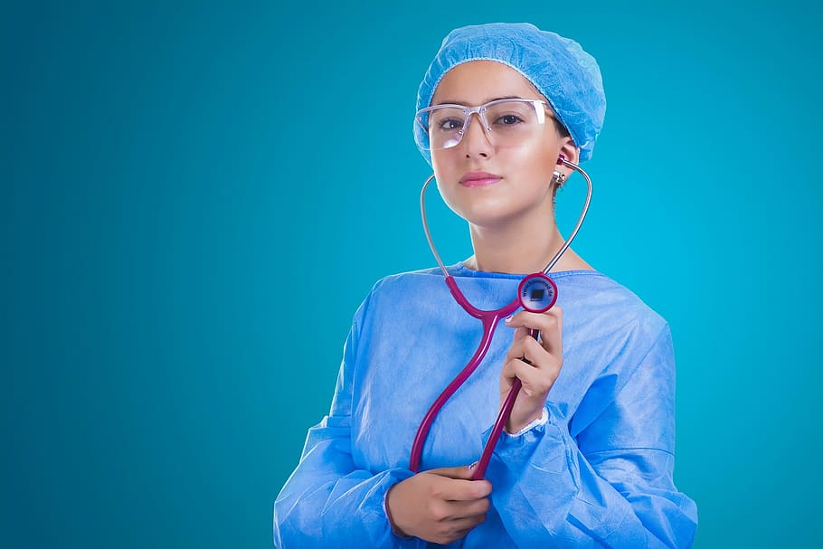 woman, blue, long-sleeve shirt, gray, steel, framed, eyeglasses, nurse, stethoscope, medicine