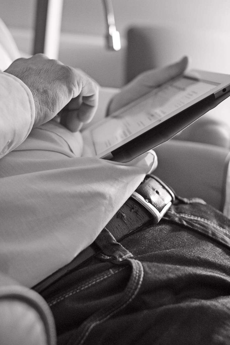 grayscale photo, man, holding, table computer, ipad, plan, business, check, see, take time