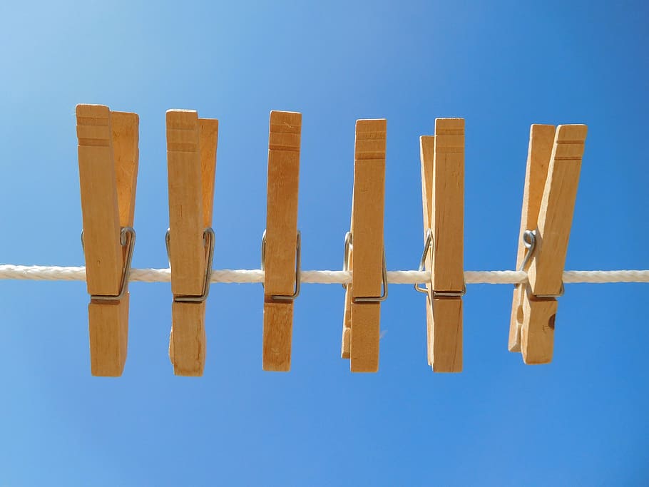 six, brown, wooden, clothes pins, clothespin, wooden clothespins, clothesline, wood - Material, blue, in a row