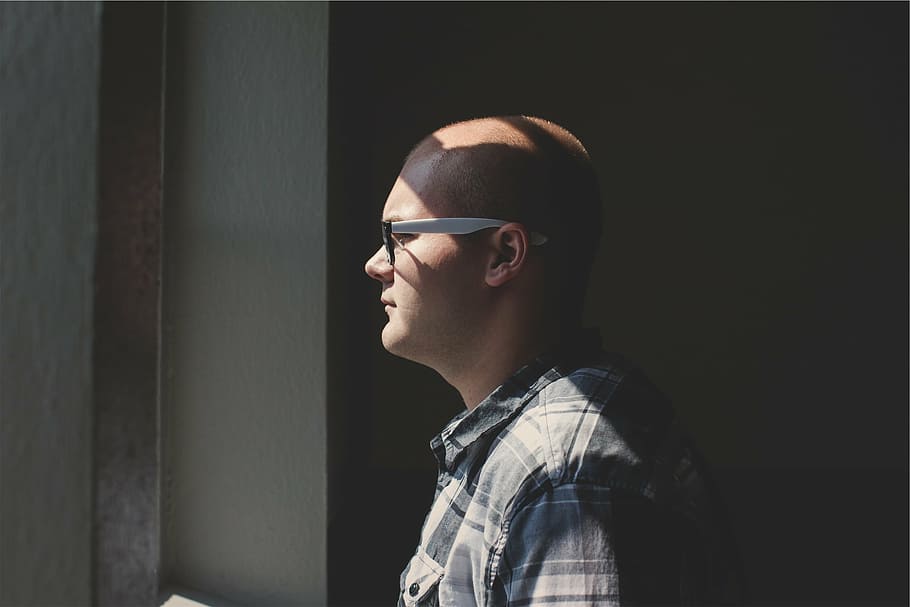 man, standing, facing, window, wearing, white, temple eyeglasses, guy, eyeglasses, bald