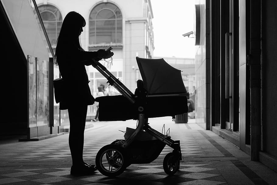 silhouette, woman, bassinet stroller, girls, cucoloris, baby, black and white, one person, architecture, full length