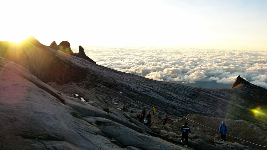group, people, hiking, mountain peak, daytime, mountaineers, gray, mountain, sky, clouds