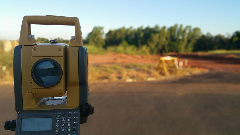 brown, black, land survey, daytime, shallow, focus photography, topography, surveying, total station, technology