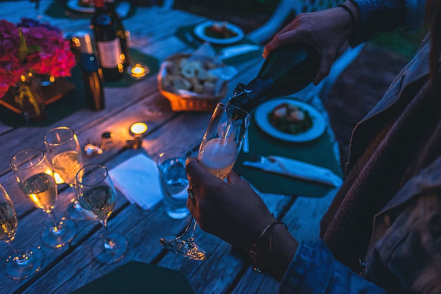 person, holding, bottle, pouring, wine glass, blur, celebration, dark, dinner, evening
