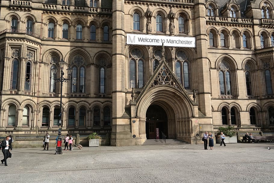 people, manchester town hall building, daytime, manchester, albert square, manchester city council, architecture, built structure, group of people, arch