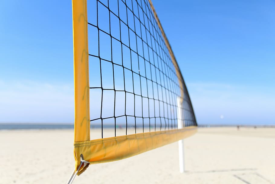 close-up photography, yellow, volleyball, net, beach, beach volleyball, volleyball net, playing field, sky, sea