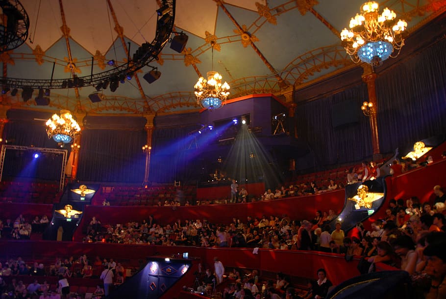 people, sitting, inside, stadium, night, circus, circus tent, marquee, audience, stage - Performance Space