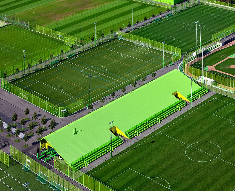 several soccer fields, green, field, sport, venue, game, tournament, fence, aerial, view