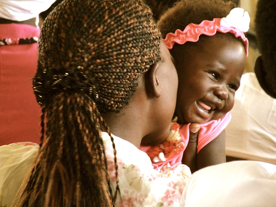 white, dressed, woman, kissing, pink, baby, africa, african, black, happy