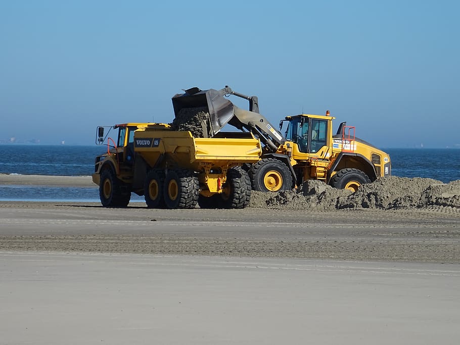 wangerooge, beach, dike construction, wheel loader, construction machinery, transportation, road, construction industry, earth mover, land vehicle