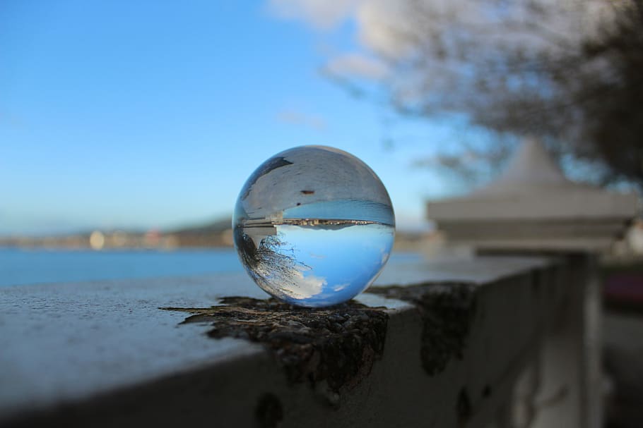body of water, nature, outdoors, sea, sky, sphere, reflection, glass - material, close-up, day