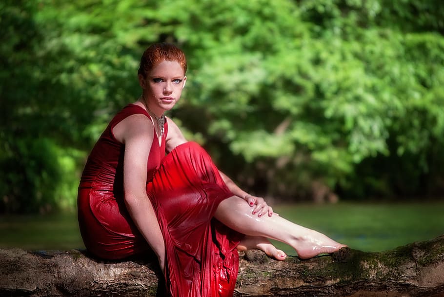 woman, wearing, red, sleeveless dress, girl, sitting, tree, water, river, young