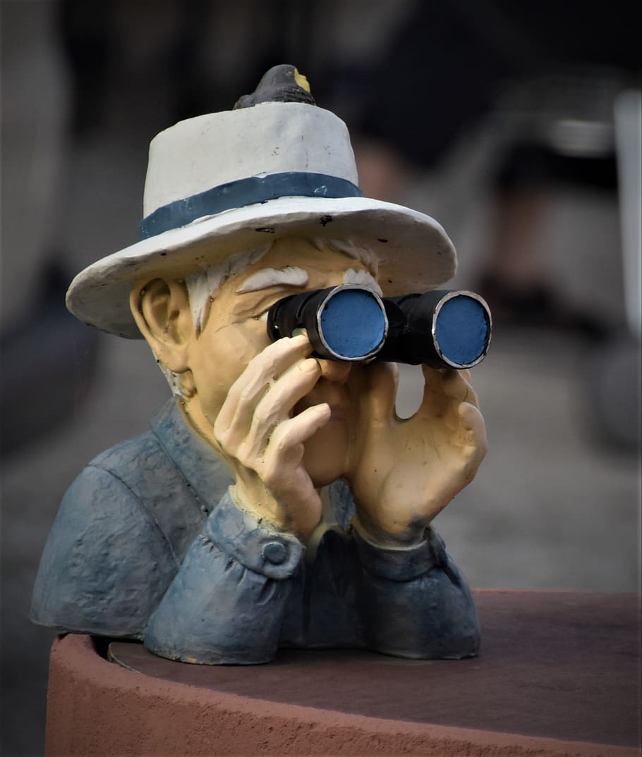 watch, neighbor, observation, binoculars, focus on foreground, one person, men, hat, front view, day