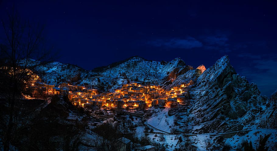 white, brown, mountain, areal photo, turned, lights, village, snow, filled, castelmezzano