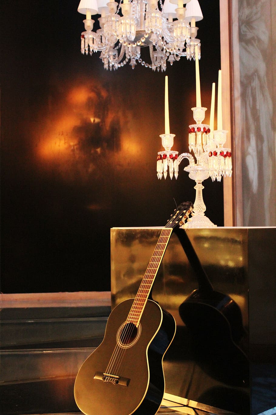 music, guitar, candle holder, art, musical instrument, string instrument, illuminated, lighting equipment, musical equipment, arts culture and entertainment
