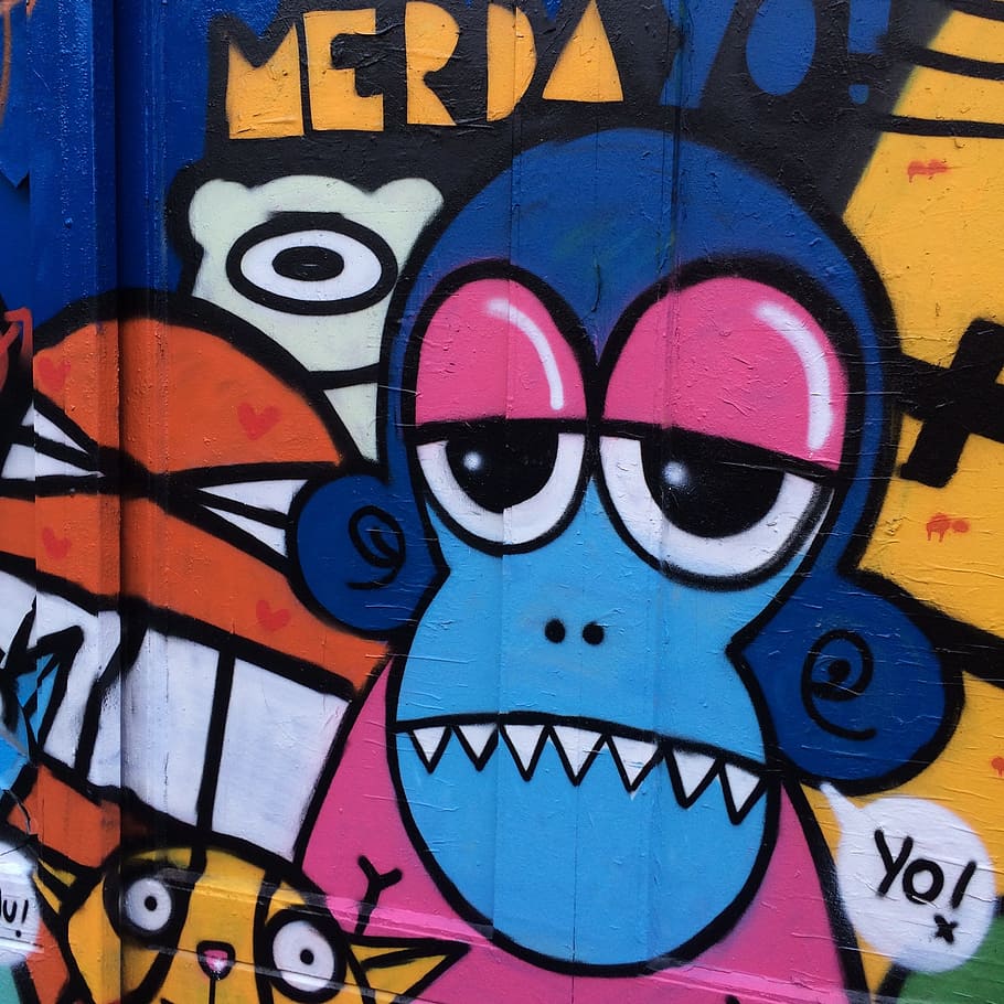 blue, pink, white, yellow, monkey spray art, monkey graphic, graffiti background, painted monkey, hand drawn, graffiti art