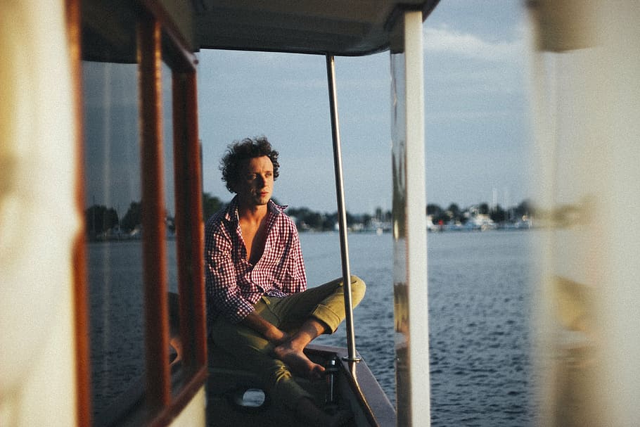 man, sitting, boat railing, blue, sky, daytime, men, s, wearing, red