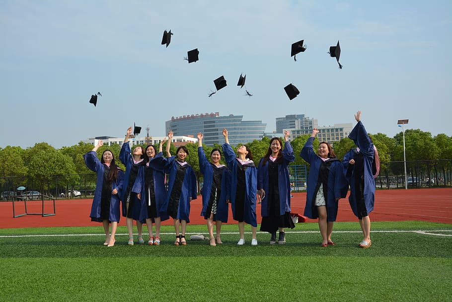 graduation, master's cap, campus, group of people, men, sky, real people, full length, plant, grass