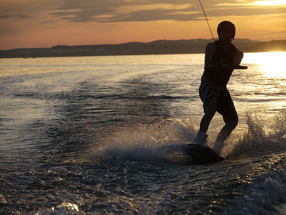 man wakeboarding, body, water, dusk, lake, lake constance, wakeboard, boot, summer, sunset
