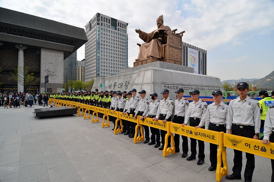 security, standing, statue, daytime, seoul, korea police line, riot police, protest, crowd, group of people