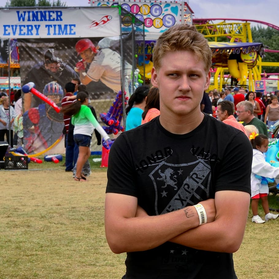 man, crossing, arms, standing, carnival, daytime, boy, indiana, fair, young
