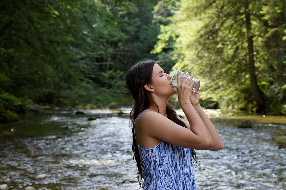 river, water, woman, girl, drink, nature, forest, environmental protection, nature conservation, fluid intake