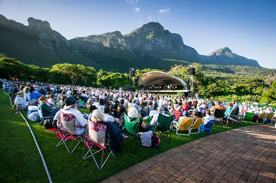 group, person, sitting, armchairs, outdoor, kirstenbosch botanical gardens, summer concert, big band, band, stage