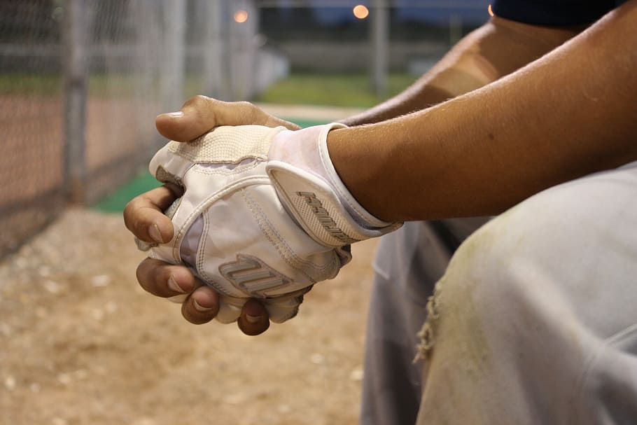 closeup, person, wearing, white, fingerless glove, baseball, substitute, bench, hands, gloves