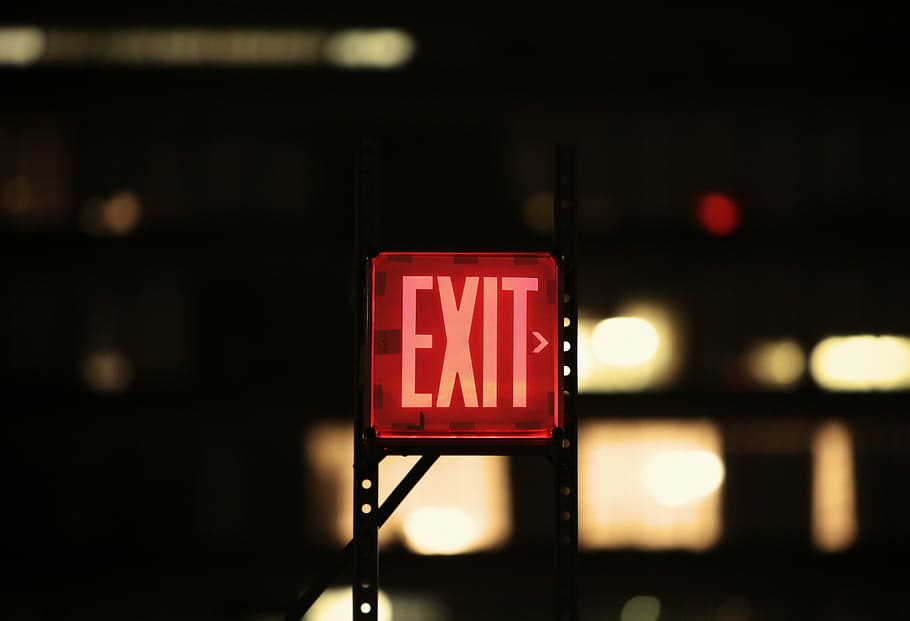 turned-on exit signage, red, exit, signage, sign, lights, illuminated, night, communication, text