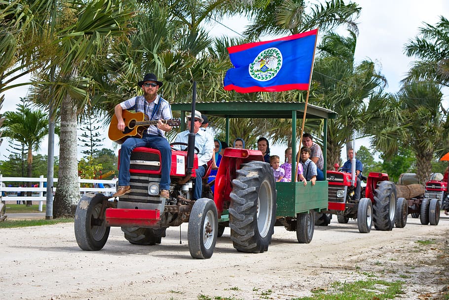 tractor, country boy, playing guitar, trailer, belize, spanish lookout, belize flag, parade, memories, recreation