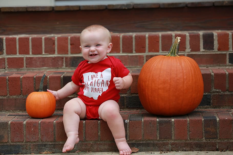baby, sitting, two, pumpkins, smiling, sports, ohio state, football, rivalry, onesie