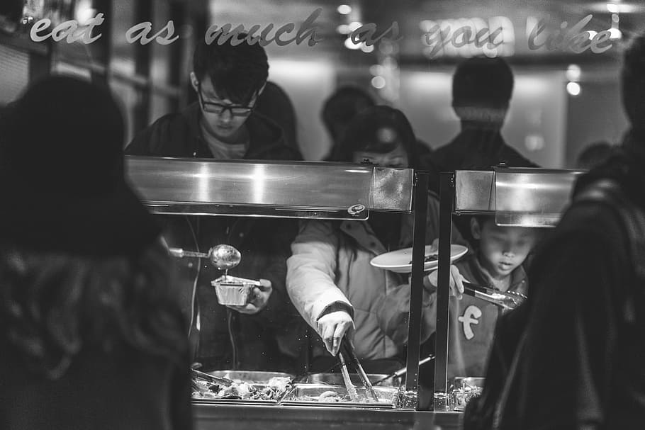 man scooping soup, grayscale, photography, people, eating, buffet, Chinese, food, lunch, dinner